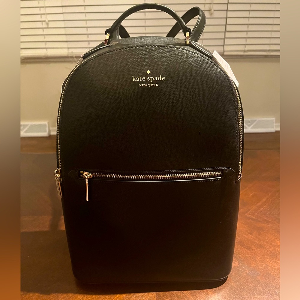 durable fabric and soft leather. Lots of space. super chic